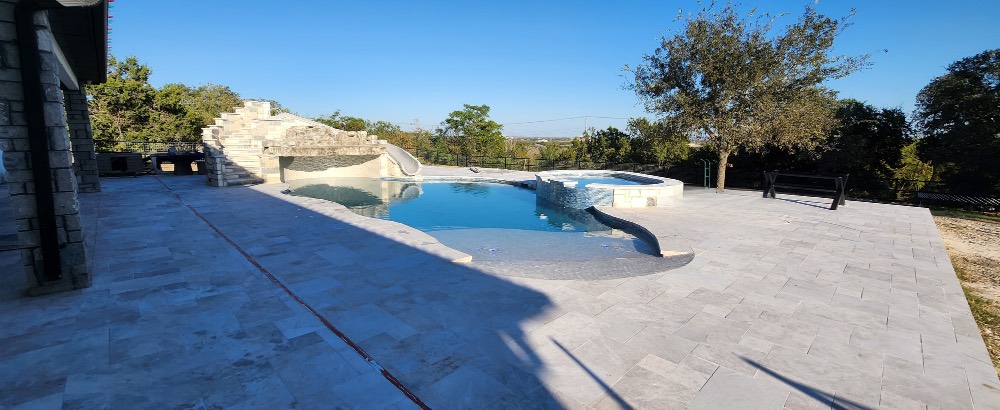 Freeform pool and spa built near Canyon Lake, Texas